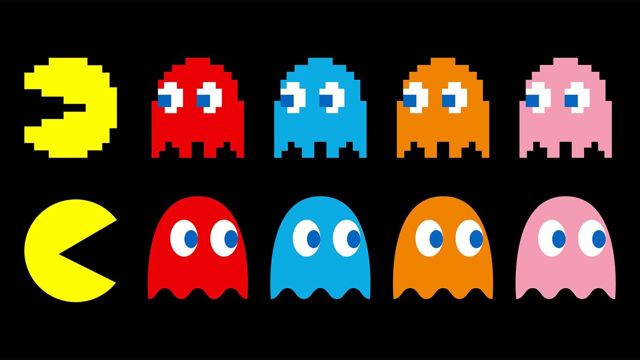 Pacman maze gameplay with ghosts and pellets
