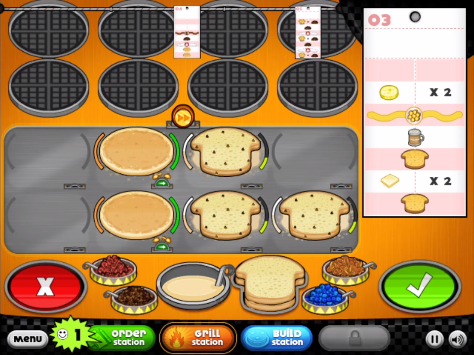Papa’s Pancakeria topping build station with syrup and fruit arrangement